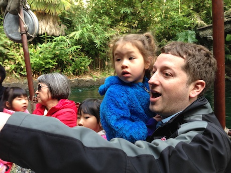 Maile and Daddy on the Jungle Cruise. The look on her face is 1/2 what in the world is going on? and 1/2 get me out of here!