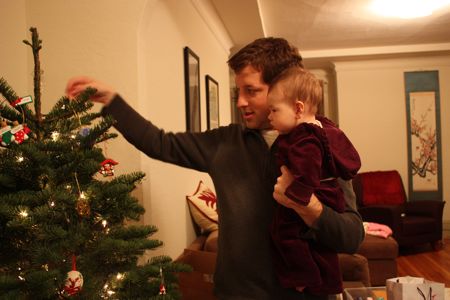 Wait, that tasty ornament goes on the tree? Can you put it a little lower? Going to be hard for me to reach up there...