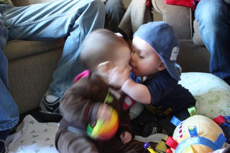 Wills started to get fresh again by trying to plant a kiss on me. I'm a little blurry in this picture because I'm employing some get away moves that daddy taught me.
