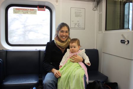 Mommy and I getting settled on the choo choo train - much different from the air plane, a lot more room to stretch your legs (not that its really a problem for me...)