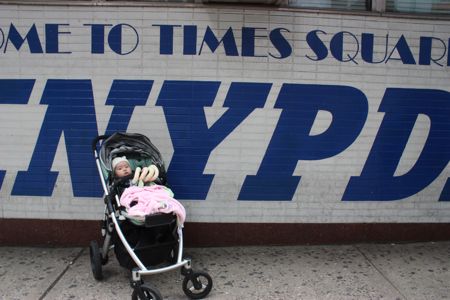 Yes, my daddy is a cheeseball - we took a picture at the NYPD stand in the middle of Times Square...