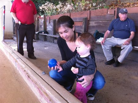 Mommy teaching Maile about Bocce. Or is it Maile teaching Mommy?
