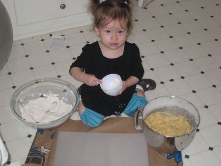 Say that again? You want me to dump the flour on the floor? Does Mommy know you are teaching me how to do this?