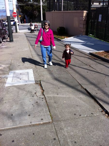 I make Gramma walk at my pace - sometimes you just need to slow things down and smell the rose ... and check out the cracks in the sidewalk ... and touch every car on the street ... and walk up to every door....