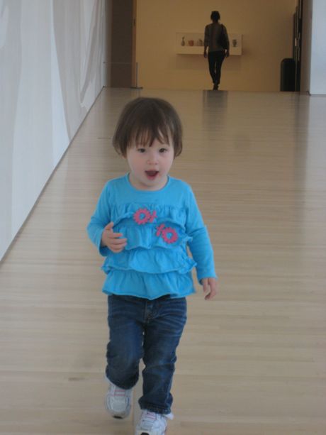 Just another little girl in the museum, checking things out...