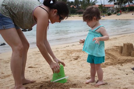 See Maile, after you fill the bucket with sand, you turn it over carefully...