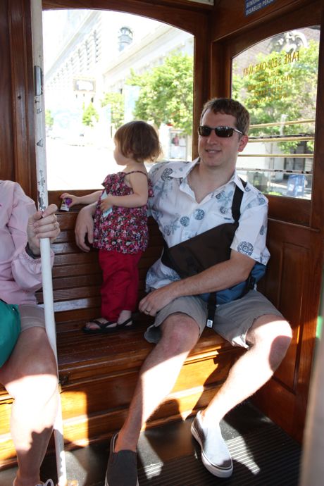 Maile and Daddy riding the cable car