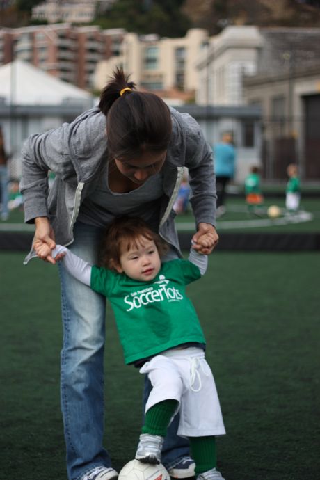 Rolling the ball back and forth is a little trickier, but Mommy helped Maile Girl out!