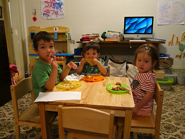 Jasper, Everett and I being interrupted during our dinner by annoying pictures...