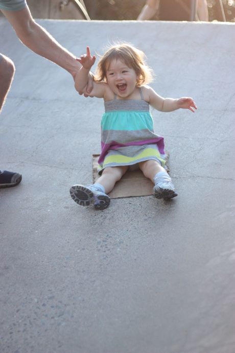 Fun on the big cement slide - so big that you needed to sit on a piece of cardboard to make it down...