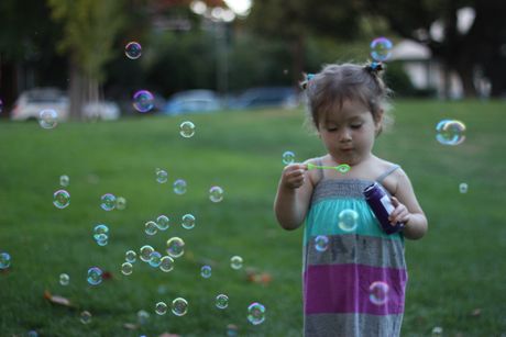 Bubble time - behind the scenes note, Mommy blew the bubbles AND took the pictures. Such talent!