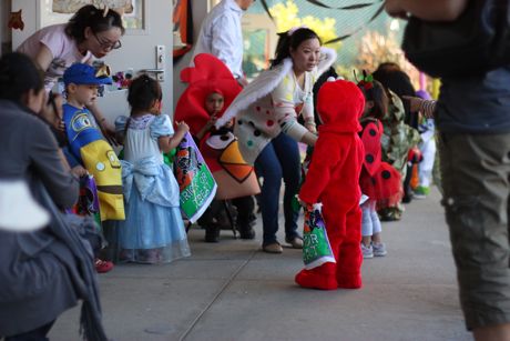 It was definitely organized chaos, but the teachers did a good job walking the kids around in small groups where they "trick or treated" at each of the different classrooms...