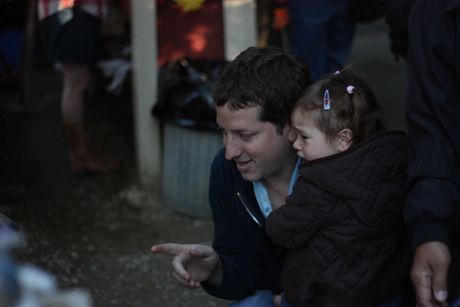 There was a petting zoo, but you'll notice no animals can be seen in this photo - that's because this was as close as Maile was willing to get...