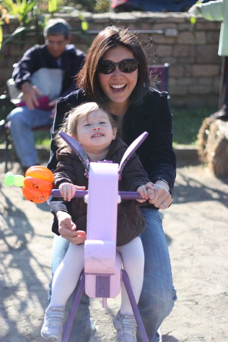 While she wanted nothing to do with the real animals, Maile was a huge fan of these pink wooden ponies!