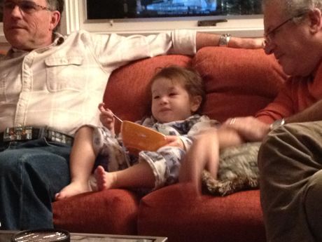 After Thanksgiving dinner, Maile enjoyed some dessert and football on the couch with Papa Mike and his friend Steve...