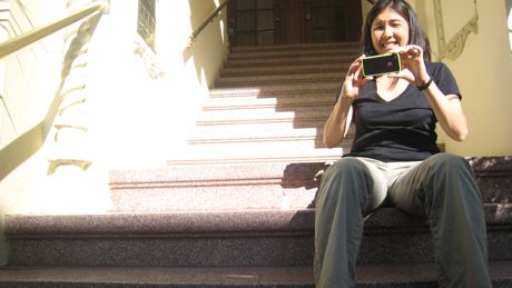 Mommy on the stoop taking a picture of me taking her picture!