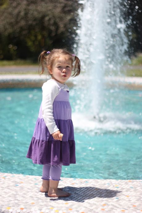Checking out the fountain. No, Maile, you can't go in the water.