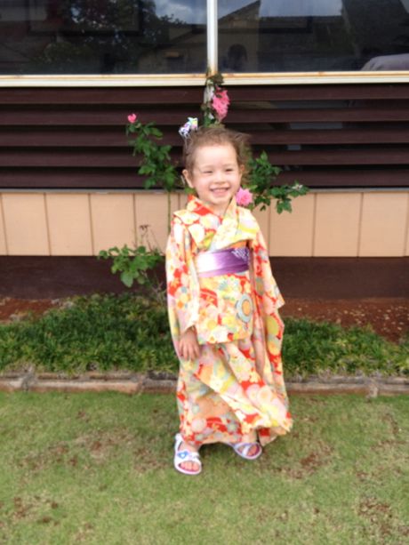 Maile dressed up all fancy in one of mommy's old kimonos. She felt like a princess and, boy, did she look the part!