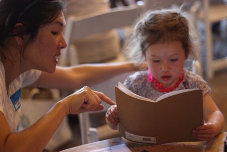 Maile & Mommy checking out Mommy's sketchbook - Maile was very happy to see she was prominently featured!