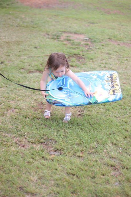 Grandma and Papa bought Maile a boogie board - Daddy can't wait to hit the waves with her.