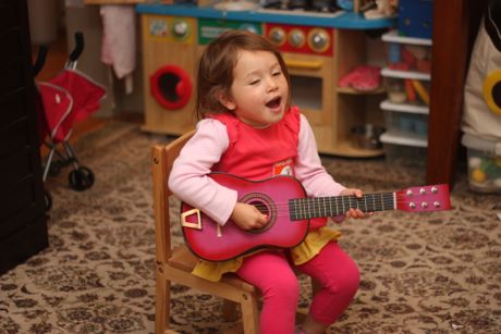 The guitar. The outfit. The chair. Love!