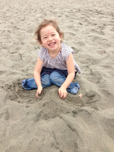 Maile Girl building her entry for the sand castle competition