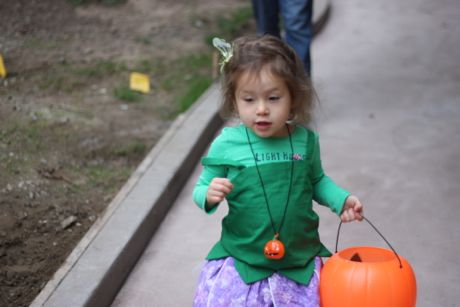 Okay, here I go - trick or treating time. I covered this with Mommy and Daddy: ring the bell, say trick or treat, get a treat, say thank you and Happy Halloween. Piece of cake!