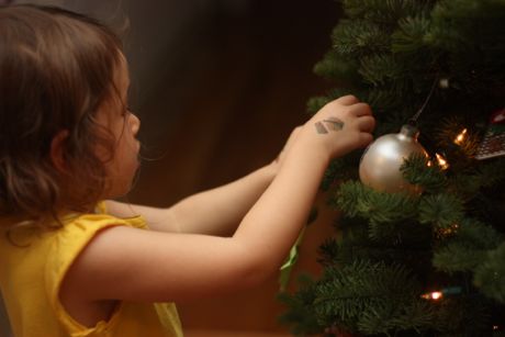 Step #3: Carefully add the ornaments to the tree one at a time