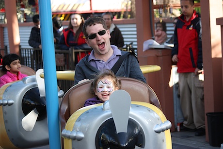 This airplane ride that went around in circles was Daddy's ... er Maile's favorite - we went twice back-to-back (yep, I taught Maile the old, get off and run really fast to get back in line move. She executed it like a pro!)