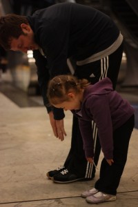 Stretching while we wait for the BART...