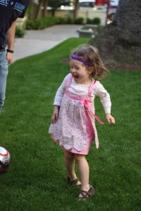 Maile has definitely patented the laugh-so-hard-I'll-make-Daddy-laugh-too-and-then-I'll-take-the-ball move...