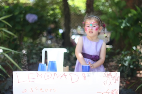 All setup with her very own lemonade stand...
