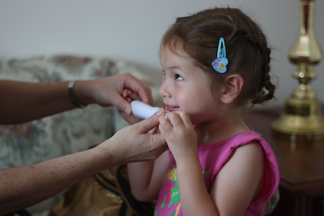 Then Aunt Julie showed Maile how to place her mouth on the flute and the proper way to blow air...