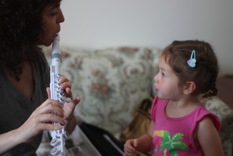 First Aunt Julie showed Maile all the pretty sounds that the flute could make and played some songs she already knew... this definitely piqued her interest!