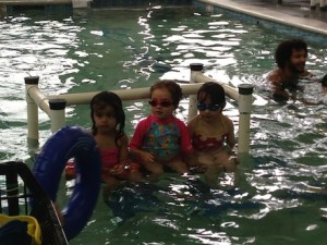 Our little swimmer getting ready for the next part of her class...