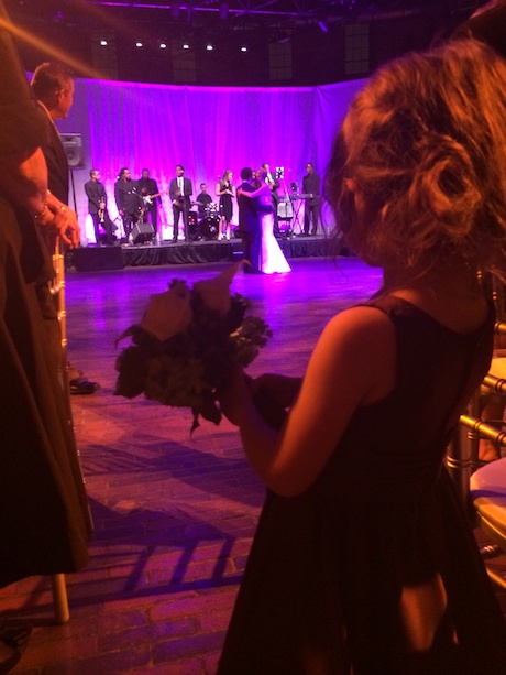 Maile takes in Auntie Elyssa and Uncle Stephen's first dance...