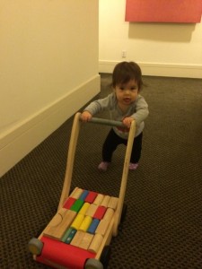 Lauren is loving the carpeted hallways in our new building!