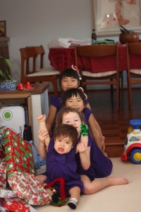 We attempted many times to take pictures all in the same purple dresses that Grandma got us - they didn't all work out, but we still had fun trying...