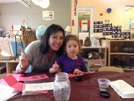 Mommy and Maile writing their new year's wish