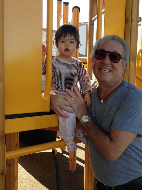 Exploring the jungle gym with Papa...