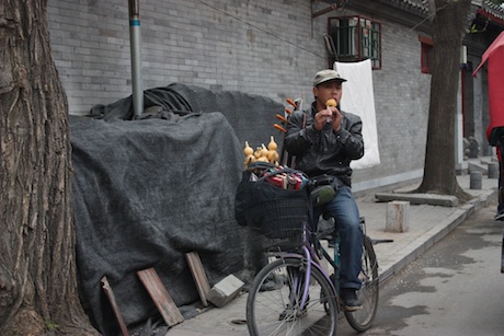 This guy followed us around the hutongs for about a half hour - he started off asking 80 Yuan for his flutes, we finally bought them at 15.