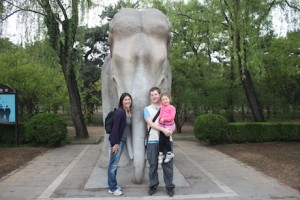 Family shot with one of the stone elephants lining the Sacred Way at the Ming Tombs