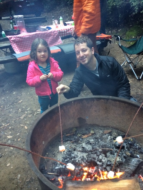 Daddy taught Maile the fine art of s'more making!
