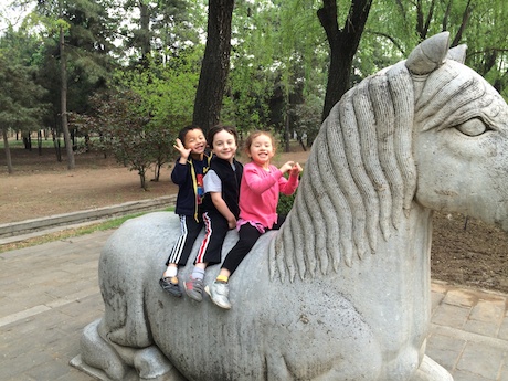 Goofing around on the stone animal statues...