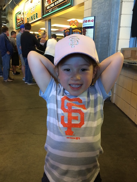 Maile's first ballcap - yes, it's pink. BUT it's not the princess one they were selling, so I consider that a victory. A small one, but a victory all the same.