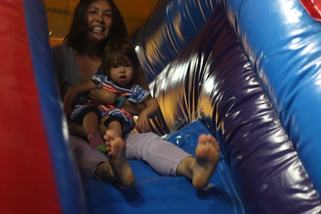 Lauren dragged Mommy, Daddy and Aunty Jen all over the bouncy houses...