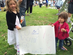 Maile and Lauren anxiously await Mommy at the finish line...