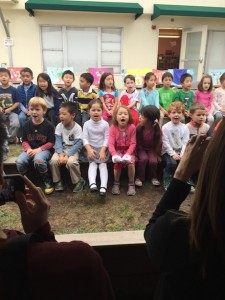 Maile and her classmates singing