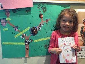 Maile with her family tree and her book about herself