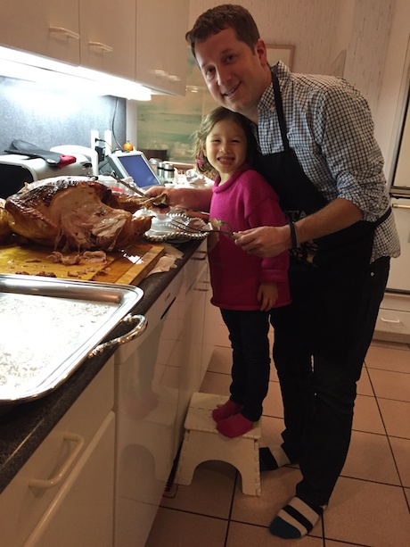 Helping Daddy carve the turkey - I think I might be ready to go solo next year. (Dad note: not quite, Maile Girl.)